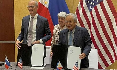 BIOMETRIC SYSTEM. UltraPass chief executive officer Eric Starr (left) and Transportation Secretary Jaime Bautista sign an agreement on Wednesday (Nov. 13, 2024) in Makati City for the pilot-testing of a biometrics passenger processing system at selected airports in the country. The signing was witnessed by Undersecretary of Commerce for International Trade Marisa Lago.