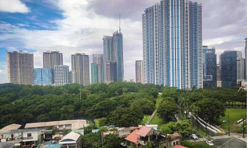 VIBRANT ECONOMY. The skyline and business district of Bonifacio Global City in Taguig City are photographed on a clear Friday afternoon (October 4, 2024). 
