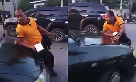 A screenshot of the viral video captures a driver in Davao City nearly running over a CTTMO officer who was trying to stop the vehicle to issue a traffic violation ticket on January 11, 2024. Davao City Police Office (DCPO) will file multiple criminal charges against the driver.
