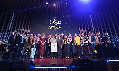 The awardees of the 6th Philippine Sports Tourism Awards gathered at Axis, NUSTAR Resort, alongside key industry figures, including Tourism Promotions Board COO Ms. Marga Nograles (7th from left), Dumaguete City Mayor Hon. Felipe Remollo (8th), Clark Development Corporation President & CEO Atty. Agnes VST Devanadera (9th), former Philippine Sports Commission Chairman Mr. William ‘Butch’ Ramirez (10th), and  PSTA Founder and Chairman and Sports Turismo Alliance Chairman, Mr. Charles Lim (11th).