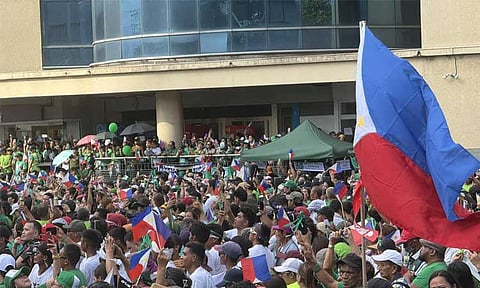 Thousands in green-filled Roxas Freedom Park, waving Philippine flags as they marked former President Rodrigo Duterte’s 80th birthday, highlighting his enduring influence in Davao City.