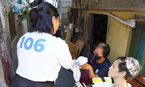 Volunteer supporters resume their house-to-house campaign efforts in Pasig City so they can spread the labor reforms of Trabaho Partylist (no. 106 in the ballot) for the workers, including the elderly and persons with disability. 