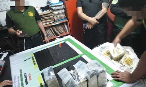 DRUGS FROM THE SEA. Authorities conduct an assessment of the estimated P1.5 billion worth of suspected shabu discovered by 10  Bataan fishermen floating in the waters  of the West Bajo de Masinloc on May 29. (Photo courtesy of PDEA)
