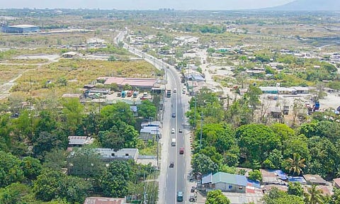 IMPROVED ROAD
An aerial view of the 
Angeles-Porac-Floridablanca-Dinalupihan Road in Barangay Mancatian, Porac which underwent improvement recently. - DPWH photo