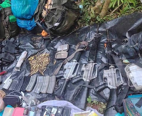 ZAMBOANGA. Troops recover three M-16 rifles and other war materials following a one-hour firefight with New People’s Army (NPA) rebels on Thursday, June 19, in Datu Ito Andong, Kalamansig, Sultan Kudarat. Three rebels and one soldier were killed. 