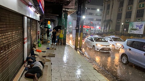 As heavy rains soak Cebu City Wednesday night, June 25, 2025, many find shelter — but not all. On soaked sidewalks, the homeless sleep in silence, exposed yet forgotten. This isn’t just heartbreaking — it’s a call to our city leaders. A call for compassion. ( Photo by LRM) 