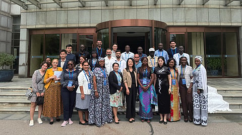 Zhou Jihong, director general of the International Cooperation Department of China’s National Radio and Television Administration (NRTA), joins nearly 30 delegates from 10 countries in a photo opportunity after her talk on the development of China’s media industry and international cooperation. The session was part of the “Journalist Leaders and Gen Z Young Leaders from Belt and Road Countries Seminar,” held on July 8, 2025, at the NRTA’s Research and Training Institute. 