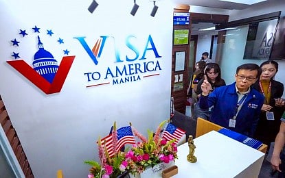 SHUT DOWN. Department of Migrant Workers Sec. Hans Leo Cacdac shuts down the operations of Visa to America Manila Inc. in Ortigas Center, Pasig City on Friday, August 1, 2025, for the illegal recruitment of Filipino workers for jobs in the United States without the necessary license. The company’s branches in Cebu, Quezon province, Iloilo, Isabela, Davao, and Zamboanga were also shut in a simultaneous operation. 