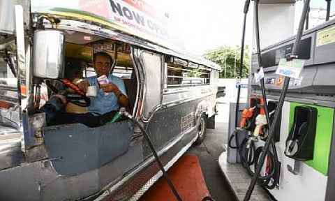 PRICE HIKE. A jeepney driver refuels his unit in this undated photo. Fuel prices will again increase on Tuesday (Aug. 5, 2025) by as much as PHP1.90 per liter. (PNA file photo by Joan Bondoc)