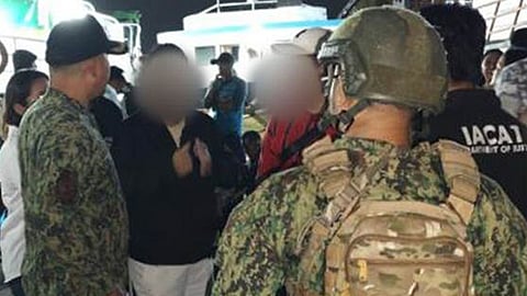 ZAMBOANGA. Lawmen arrest three illegal recruiters as they rescue 38 potential human trafficking victims individuals, including four minors, in a law enforcement operation on Friday, August 8, 2025, at a private wharf in Baliwasan village, Zamboanga City. (SunStar Zamboanga)