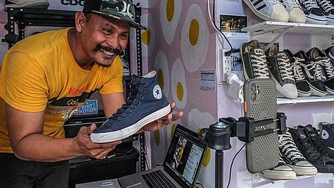 From shutterbug to shoe seller
