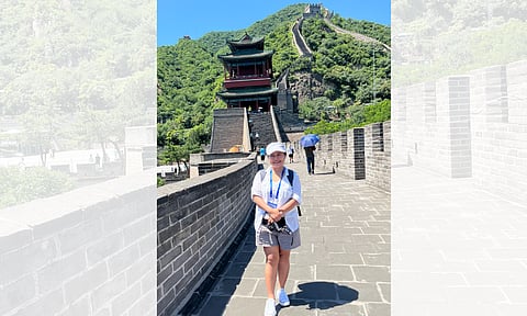 READY FOR THE CLIMB. Striking a pose before the climb at the Great Wall of China during the July 2025 summer heat, as part of the Journalist Leaders and Gen Z Young Leaders Seminar for Belt and Road Countries. 