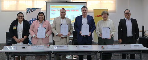 MOU SIGNING. Department of Trade and Industry-Export Marketing Bureau (DTI-EMB) director Bianca Pearl R. Sykimte and DHL executives formalize the partnership through an MOU signing on 10 September 2025 at DHL Service Center, Pasig.