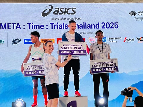  ON TOP AGAIN. Sonny Wagdos of the Philippines, center, beams on the podium after defending his men’s 10K title at the Asics META: Time: Trials Thailand 2025 on Sunday, September 14. Wagdos clocked 31:57 to finish ahead of Indonesia’s Daniel Simanjuntak and Thailand’s Pongsakorn Suksawat.
