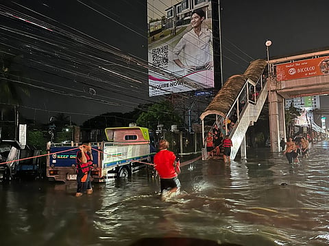 BACOLOD. The Bureau of Fire Protection (BFP)-Bacolod rescued some stranded individuals in front of a mall in Barangay Mandalagan, Bacolod City after floodwater reached 3 to 4 feet on Thursday evening, October 9, 2025. 