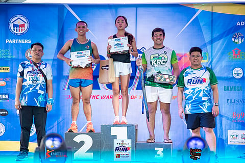 WOMAN POWER. Sheinee Fenn Suico, center, outshines male rivals to clinch the 5K title of the National Shelter Month 2025 Run held Sunday, October 26, in an out-and-back course from the  Davao Global Township (DGT) in Matina.