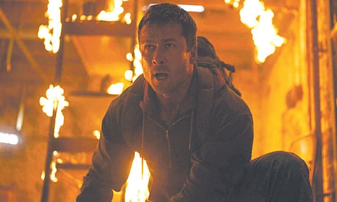 Glen Powell runs for his life in ‘The Running Man’