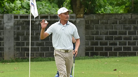 CLUTCH FROM THE GREEN. Jeffrey Lumbo reacts after sinking a decisive putt en route to winning the ICTSI South Pacific Classic in a five-hole playoff against Russell Bautista on Friday in Davao City. Lumbo rallied from five shots down to force sudden death, then clinched the breakthrough victory with a 16-foot birdie on the final playoff hole.