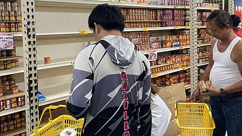 Travel gridlocked, panic buying rises as typhoon nears