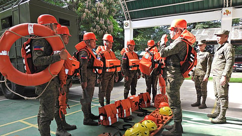 ILOILO. Members of the 61st Infantry (Hunter) Battalion in Miagao, Iloilo prepare their Hunter Emergency Action Response Team (Heart) equipment and vehicles for deployment as Typhoon Tino nears Western Visayas.  