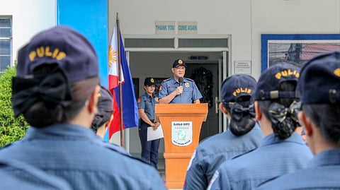 ILOILO. Members of the City Explosive Ordnance Disposal and Canine Unit inspects a university in Barangay Jaro, Iloilo City, on November 12, 2025, following a false threat. The area was declared safe after a thorough search. Police Colonel Kim Legada, city director of the Iloilo City Police Office, reminded the public that making or sharing bomb threats is a crime. 