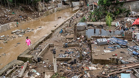 DAMAGED. Sta. Luisa Homes in Barangay Pit-os, Cebu City, suffered severe damage after Typhoon Tino battered Cebu early morning on November 4, 2025. Floodwaters submerged vehicles and houses in the community. / Juan Carlo de Vela 
