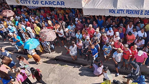 P10,000 aid for Odette victims released as NHA starts distribution in Carcar