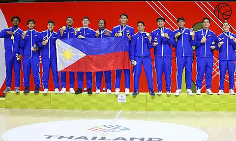 SEA GAMES BASKETBALL KINGS. Members of the Gilas Pilipinas national men’s basketball team celebrate winning their gold medals at the close of the 33rd Southeast Asian (SEA) Games in Thailand over the weekend.