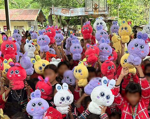 Indigenous Peoples’ children from Barangay Tapak in Paquibato happily receive SM Besties of Joy.