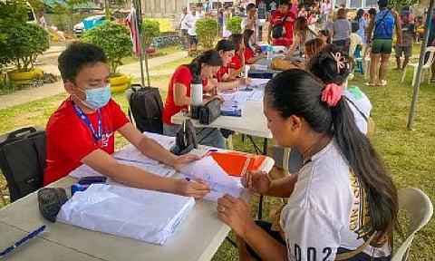 GOV’T ASSISTANCE. Fire-affected families receive government assistance through the Department of Social Welfare and Development’s Assistance to Individuals in Crisis Situation in Pilar, Sorsogon on March 15, 2025. The DSWD said on Sunday (Jan. 18, 2026) that the AICS will serve the clients of the now-defunded Ayuda sa Kapos ang Kita Program. (Photo courtesy of DSWD-5)