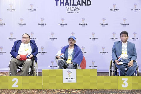 ALL-PINOY SWEEP. Arena grand master (AGM) Henry Roger Lopez of Panabo City, left, joins her two other teammates as  the Philippines swept the gold, silver, and bronze medals in blitz team event of the physically impaired (PI) men’s category at the Asean Para Games chess tournament in Nakhon, Ratchasima, Thailand.