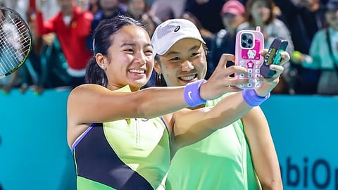 Philippines’ Alex Eala and Indonesia’s Janice Tjen share a light moment after securing a 7-5, 3-6, 10-6 doubles win over Leylah Fernandez of Canada and France’s Kristina Mladenovic in Wednesday’s round of 16 (Philippine time).