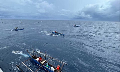 SUCCESSFUL. Boats belonging to the "Atin Ito" civilian convoy sail in the vicinity of the Pag-asa Island in the West Philippine Sea on May 28, 2025. Lawmakers underscored the need for a fact-based and unified national position on the West Philippine Sea, warning that personal attacks and misinformation weaken public understanding of Philippine sovereignty at a time of heightened geopolitical tension. (Photo courtesy of Atin Ito)