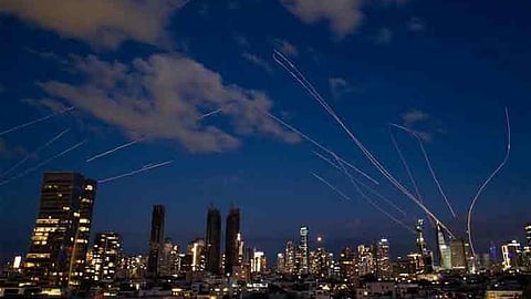This long exposure photo taken on February 28, 2026 shows flare trails of the interceptor missiles launched from Israeli air defense systems in Tel Aviv, Israel. 
