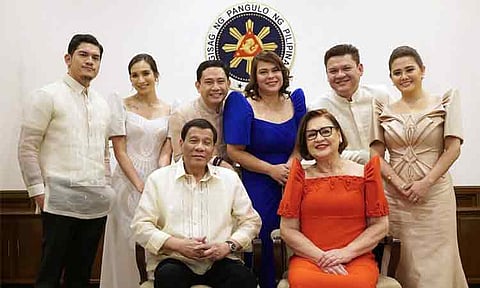 In this file photo, then-President Rodrigo Roa Duterte poses for a photo with the first family after delivering his third State of the Nation Address (SONA) at the Session Hall of the House of Representatives Complex in Constitution Hills, Quezon City on July 23, 2018.