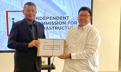 WINDING UP. Independent Commission for Infrastructure chair Andres Reyes Jr. turns over to Ombudsman Jesus Crispin Remulla their findings on the anomalies surrounding flood control projects, in this undated photo. Reyes has recommended the winding up of the ad hoc body's operations by the end of the month. (ICI photo)