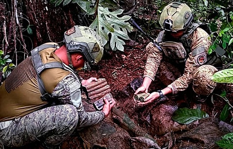 ILOILO. Troops of the 82nd Infantry (Bantay Laya) Battalion recover an arms cache believed to have been hidden by remnants of the Communist Terrorist Group Komiteng Rehiyon-Panay during an operation in the hinterland boundaries of Libacao, Aklan, Iloilo, and Capiz on March 14, 2026. 