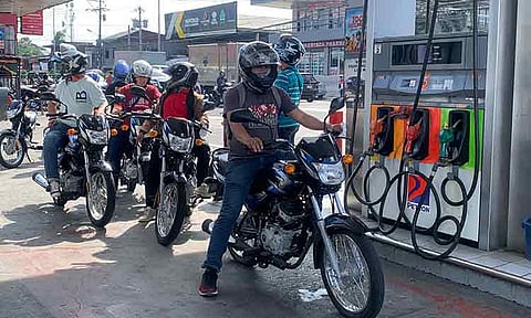 Motorists flock to fuel stations in Davao City on Tuesday, April 14, 2026, to take advantage of a price rollback in petroleum products.