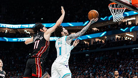 Hornets nip Heat in OT