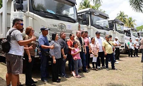 BOOSTING SUGAR INDUSTRY. Sugar Regulatory Administration (SRA) Administrator and CEO Pablo Luis Azcona leads the turnover of dump trucks for sugar farmers at the La Granja Agricultural Research and Extension Center (LGAREC) compound on Thursday (April 16, 2026). Azcona said mechanization is no longer a luxury but a necessity to boost the country's sugarcane industry. (Photo courtesy of SRA)