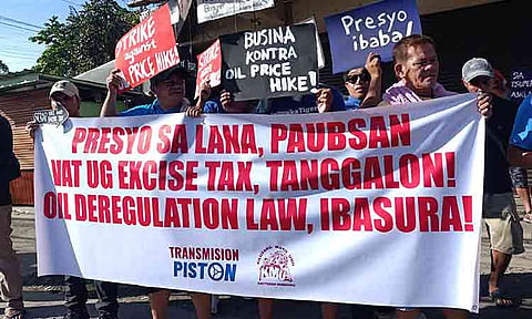 DRIVERS SEEK FUEL RELIEF. Jeepney drivers from Matina Pangi stage a rally at Matina Crossing in Davao City on Friday, March 27, 2026, calling for a rollback in fuel prices and the removal of value-added tax as diesel exceeds ₱100 per liter and gasoline prices continue to rise. The protest comes amid a worsening global oil crisis linked to conflict in the Middle East, which has disrupted supply and driven prices higher, prompting President Ferdinand Marcos Jr. to declare a national energy emergency. 