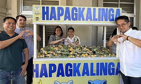 Tricycle drivers receive ready-to-cook food packs 
