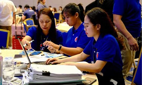 FINALIZED PLEADINGS. Department of Transportation (DOTr) personnel write an expropriation pleading during a three-day workshop in Pampanga in this undated photo. Acting DOTr Secretary Giovanni Lopez on Thursday (April 23, 2026) said a record 345 finalized expropriation pleadings were completed on April 14-16, 2026. (Photo courtesy of DOTr)