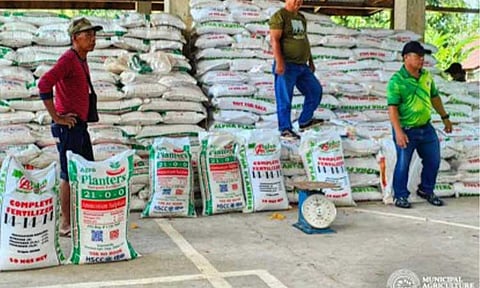 FERTILIZER. Farmers receive bags of fertilizer from the Department of Agriculture in Caraga Region in Carrascal, Surigao del Sur on Tuesday, Oct. 28, 2025. The DA on Tuesday (April 21, 2026) said it is eyeing to break ground for the first fertilizer plant in the Philippines within the year. (Photo courtesy of DA-13)