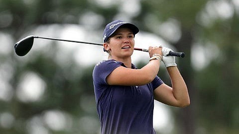 Green makes ace, takes share of lead