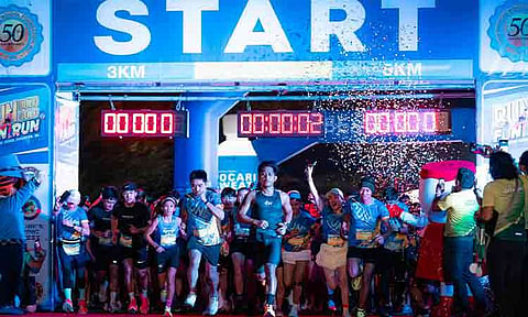 RUNNING FOR GOLD, RUNNING FOR CARE. Runners break from the starting line during Davao Medical School Foundation’s “Run Bold, Run Gold” Fun Run along the Davao Coastal Road in Bago Aplaya on April 25, 2026, as the 50th anniversary event raised funds for a maternal and child birthing home in Marilog District.