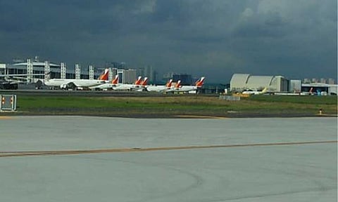 LOWER FUEL SURCHARGE. Philippine Airlines fleet at the Ninoy Aquino International Airport in this undated photo. The Civil Aeronautics Board announced on Tuesday (May 12, 2026) that Level 15 fuel surcharge will be in effect from May 16-31, down three notches from Level 18 in the first half of May. (PNA file photo by Cristina Arayata)