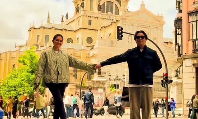 Dimples Romana arrives in Spain with husband