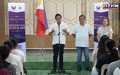 PRESIDENTIAL SCHOLARS. President Ferdinand R. Marcos Jr. speaks to presidential scholars at the Obando Central School in Obando, Bulacan on Thursday (May 21, 2026). A total of 55 students in the municipality will receive PHP20,000 each under the Socio-Civic Projects Fund initiative. (RTVM screengrab)