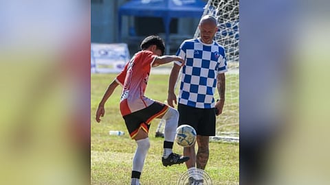 BOOT CAMP LESSONS. Former Philippine Azkals star Stephan Schrock works with a young participant during a recent Azkals Development Academy (ADA) boot camp, where aspiring footballers trained in technical skills and game development. Schrock is expected to attend the ADA Davao Boot Camp on May 29-31 at the Tionko Football Field in Davao City.